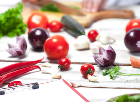 Chef cutting a green parsley his kitchen