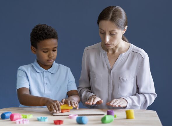 kid-doing-occupational-therapy-session-with-psychologist