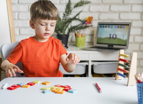 kid-with-letters-game