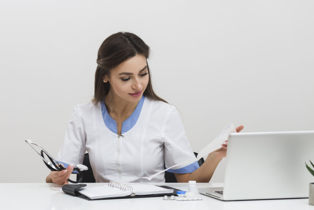 young-female-doctor-looking-n-medical-reports